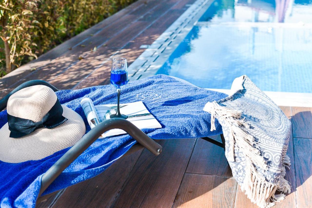 Acrotel Porto Brava Luxury Villas ออร์โมส ปานากีอาส ภายนอก รูปภาพ